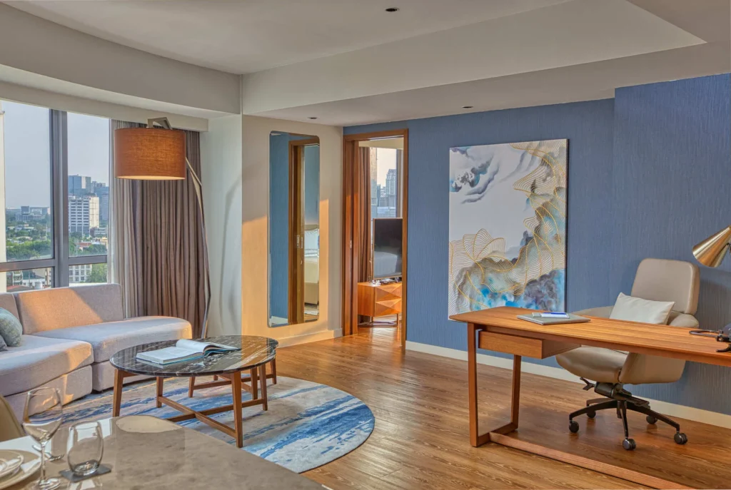 Novotel Suites Manila Premier suite Living plus work table Area By Artem Levy at Vipixel Productions