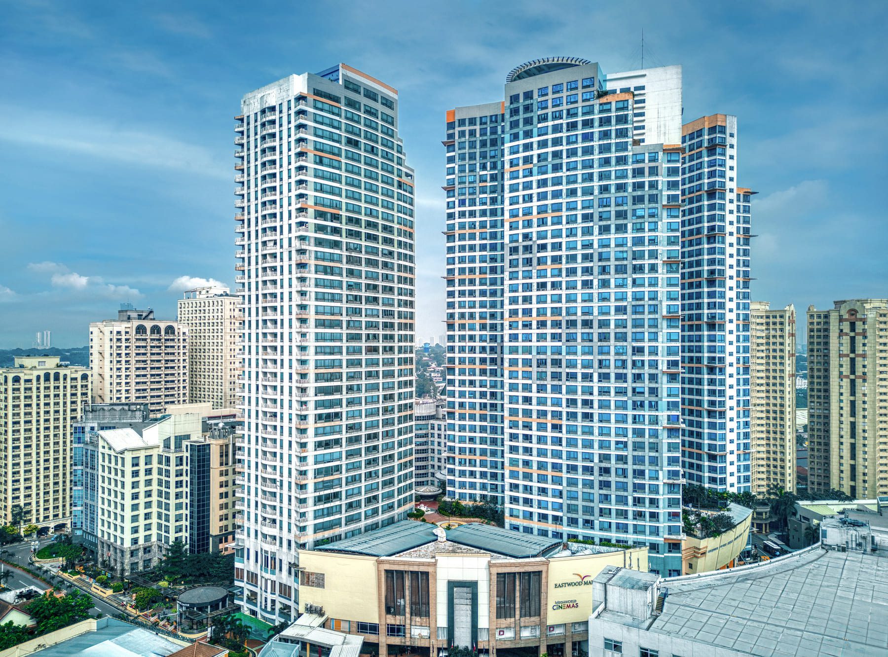 Eastwood Richmonde Hotel facade Couple in Deck Suite standing near the windows photo by Artem Levy