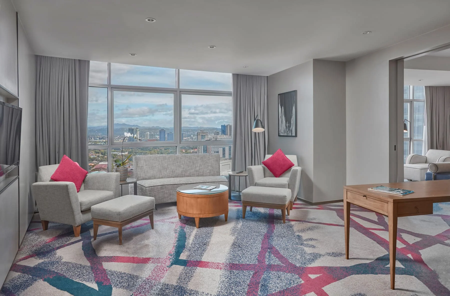 IMG_6571 Living space of one Bedroom Suite in Crowne Plaza Manila Galleria by Artem Levy at Vipixel Productions